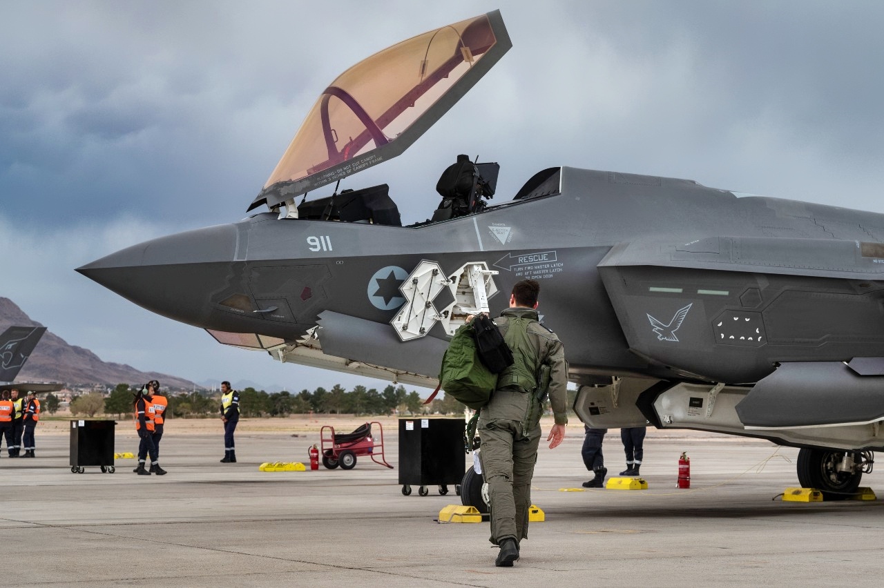 An Israeli Air Force pilot walks to an F-35I Adir prior to a Red Flag-Nellis 23-2 mission at Nellis Air Force Base, Nevada, March 15, 2023. Red Flag is an opportunity to build on the success of JUNIPER OAK 23-2, JUNIPER FALCON, and additional combined exercises to enhance interoperability with Israel, strengthen bilateral cooperation, and improve capabilities in ways that enhance and promote regional stability and reinforce the United States’ enduring commitment to Israel’s security. (U.S. Air Force photo by Airman 1st Class Trevor Bell)