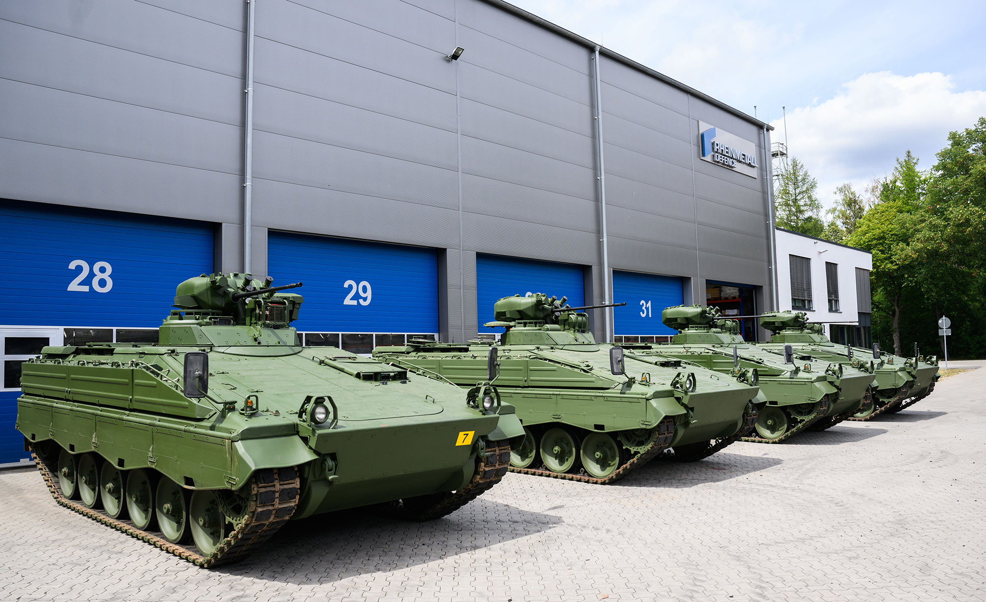 14 July 2022, Lower Saxony, Unterlüß: Reconditioned Marder infantry fighting vehicles stand during a tour of Rheinmetall's Unterluess plant on the occasion of the summer trip of Lower Saxony's Economics Minister. Ukraine wants Germany to provide it with heavier weapons to better equip it in its defensive fight against Russia. Rheinmetall had offered to supply the Marder, which had been decommissioned by the Bundeswehr and was to be reconditioned. However, according to the latest public information, the German government has not yet made a decision. Photo: Julian Stratenschulte/dpa (Photo by Julian Stratenschulte/picture alliance via Getty Images)