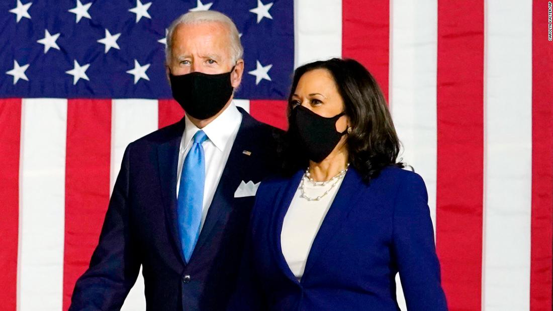 Democratic presidential candidate former Vice President Joe Biden and his running mate Sen. Kamala Harris, D-Calif., arrive to speak at a news conference at Alexis Dupont High School in Wilmington, Del., Wednesday, Aug. 12, 2020. (AP Photo/Carolyn Kaster)